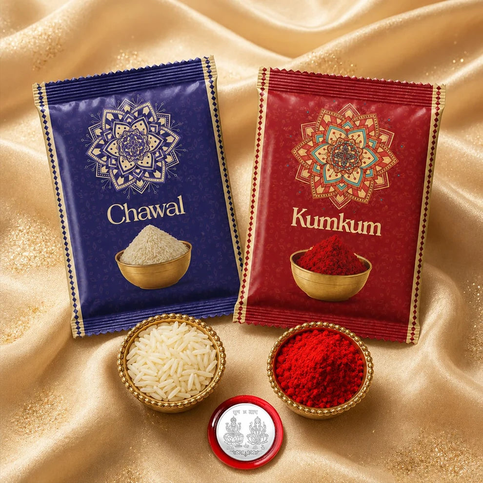 Two decorative pouches labeled 'Chawal' and 'Kumkum' arranged on a shiny gold fabric background, with small bowls showing the contents and a round silver coin in front.