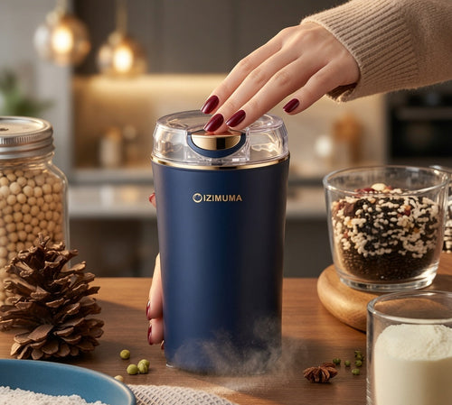 Electric coffee grinder with stainless steel blades for grinding coffee beans and spices.