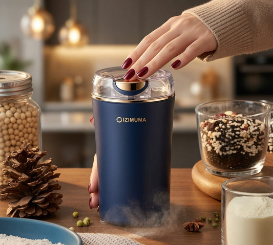 Electric coffee grinder with stainless steel blades for grinding coffee beans and spices.